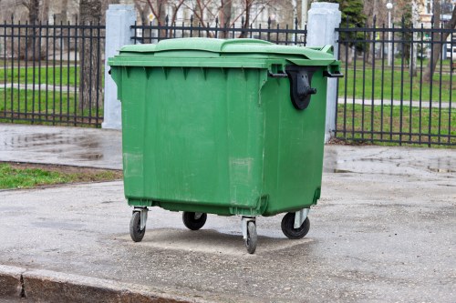 Business professionals discussing waste removal solutions in Deptford